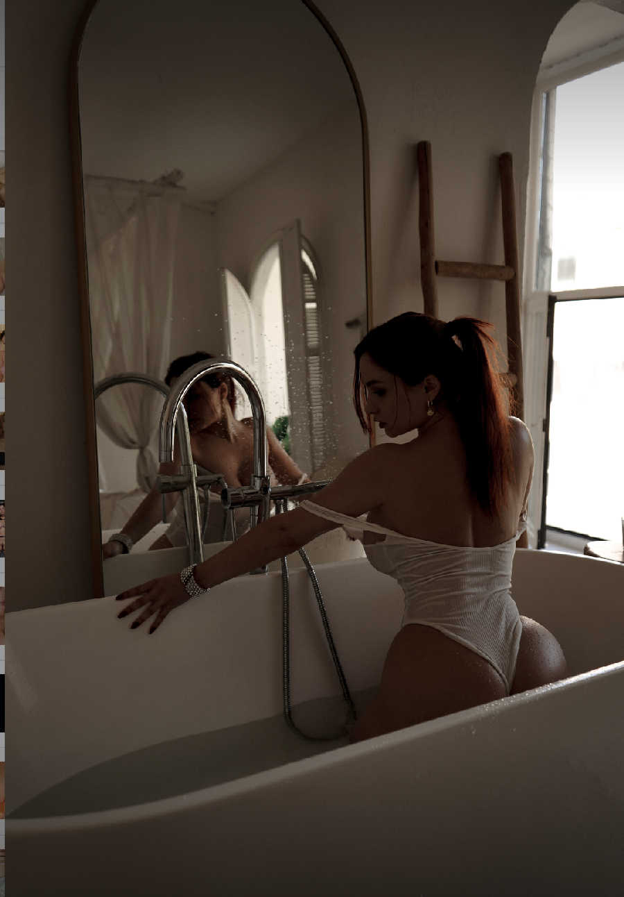 A playful frame from Miranda Faith nude — online in Surrey