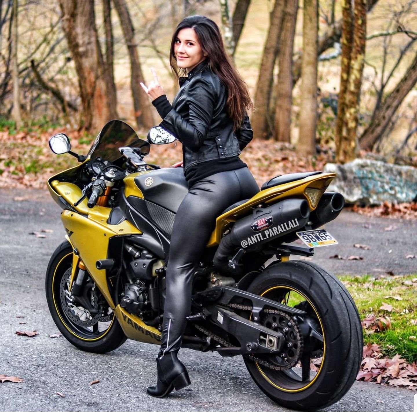 Sexy girl Brunettes on a motorcycle in Surrey